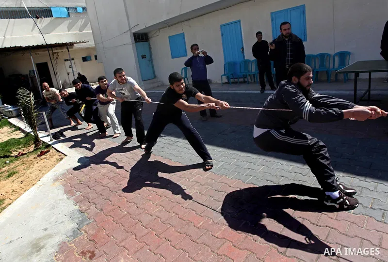Palestinian prisoners enjoy in a Hamas-run jail during "entertainment Day" by Supervision of the Red Cross in Gaza City on Mar. 22, 2012. Photo by Ashraf Amra