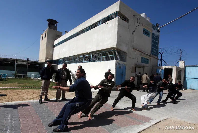 Palestinian prisoners enjoy in a Hamas-run jail during "entertainment Day" by Supervision of the Red Cross in Gaza City on Mar. 22, 2012. Photo by Ashraf Amra