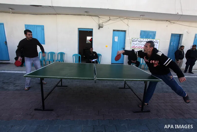 Palestinian prisoners enjoy in a Hamas-run jail during "entertainment Day" by Supervision of the Red Cross in Gaza City on Mar. 22, 2012. Photo by Ashraf Amra
