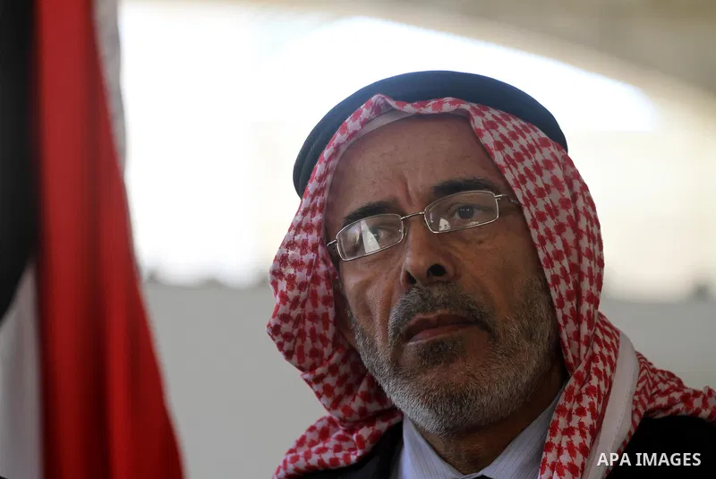 Palestinian media adviser for Prime Minister in Gaza Strip, Youssef Rizqa, delivers a speech during press conference in Gaza city on Mar. 22, 2012. Photo by Mohammed Asad