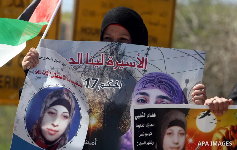 Palestinian demonstrators during a protest supporting Palestinian prisoner Hana Shalabi, outside Ofer prison near the West Bank city of Ramallah March 22, 2012. The deteriorating health of Shalabi, the Palestinian prison...
