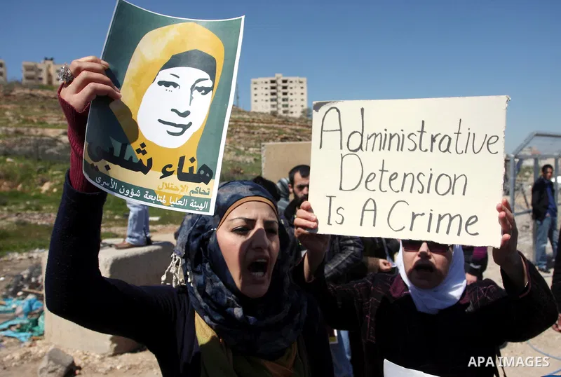 Palestinian demonstrators during a protest supporting Palestinian prisoner Hana Shalabi, outside Ofer prison near the West Bank city of Ramallah March 22, 2012. The deteriorating health of Shalabi, the Palestinian prison...