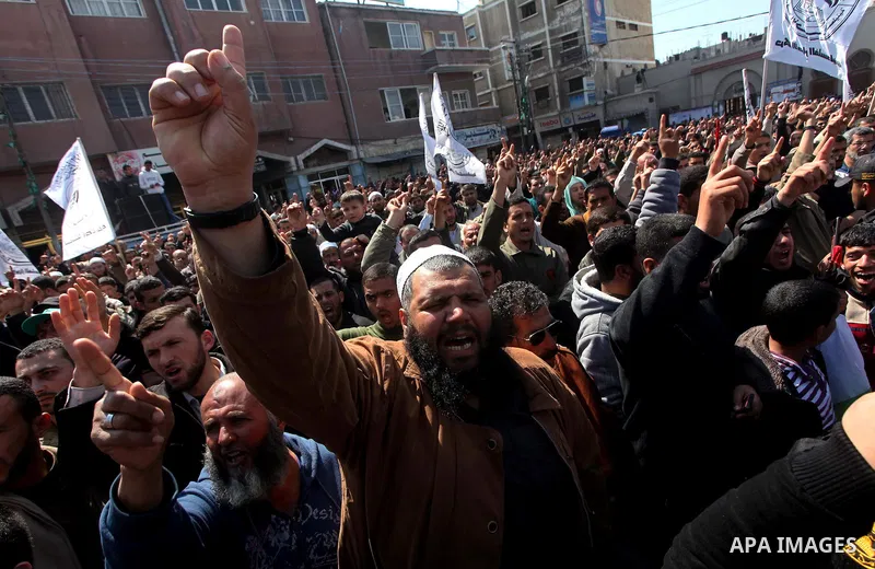 Palestinians take part in a rally calling on Egyptian authorities to supply the Gaza Strip with fuel and electricity in Khan Younis on the southern Gaza Strip March 23, 2012. Israel allowed nine fuel tankers to cross int...