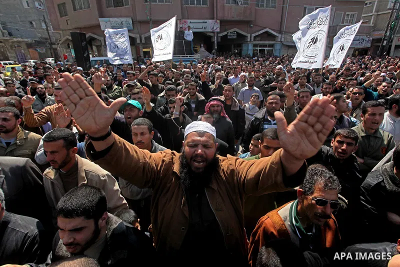 Palestinians take part in a rally calling on Egyptian authorities to supply the Gaza Strip with fuel and electricity in Khan Younis on the southern Gaza Strip March 23, 2012. Israel allowed nine fuel tankers to cross int...