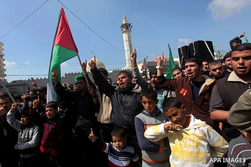 Palestinians take part in a rally calling on Egyptian authorities to supply the Gaza Strip with fuel and electricity in Khan Younis on the southern Gaza Strip March 23, 2012. Israel allowed nine fuel tankers to cross int...