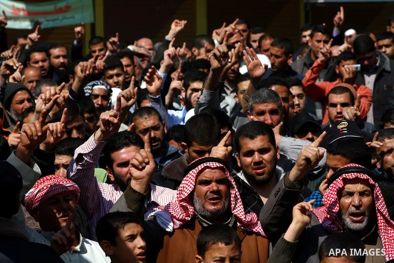 Palestinians take part in a rally calling on Egyptian authorities to supply the Gaza Strip with fuel and electricity in Khan Younis on the southern Gaza Strip March 23, 2012. Israel allowed nine fuel tankers to cross int...