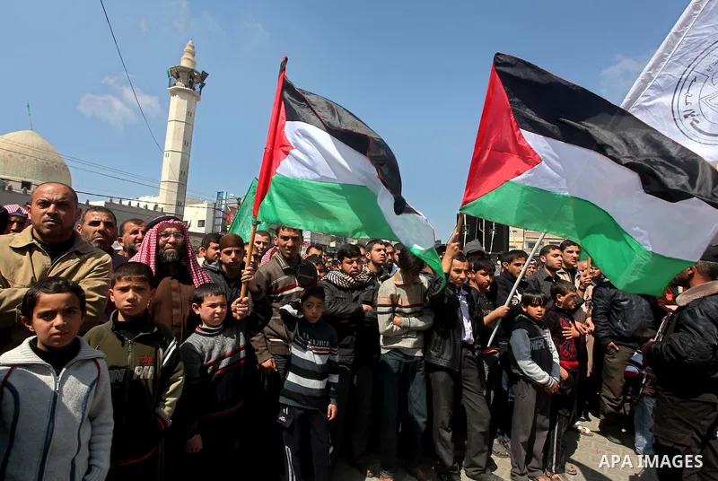 Palestinians take part in a rally calling on Egyptian authorities to supply the Gaza Strip with fuel and electricity in Khan Younis on the southern Gaza Strip March 23, 2012. Israel allowed nine fuel tankers to cross int...