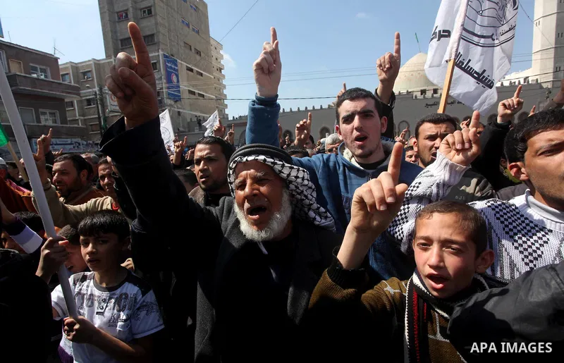 Palestinians take part in a rally calling on Egyptian authorities to supply the Gaza Strip with fuel and electricity in Khan Younis on the southern Gaza Strip March 23, 2012. Israel allowed nine fuel tankers to cross int...