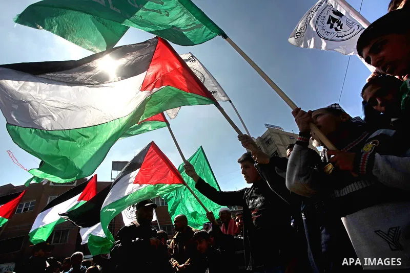 Palestinians take part in a rally calling on Egyptian authorities to supply the Gaza Strip with fuel and electricity in Khan Younis on the southern Gaza Strip March 23, 2012. Israel allowed nine fuel tankers to cross int...