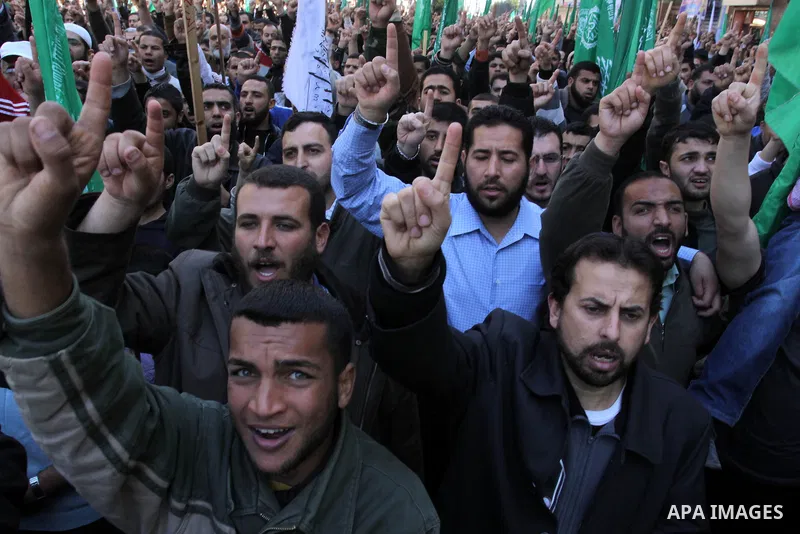 Palestinians take part in a rally calling on Egyptian authorities to supply the Gaza Strip with fuel and electricity in Gaza City March 23, 2012. Israel allowed nine fuel tankers to cross into the Gaza Strip on Friday to...