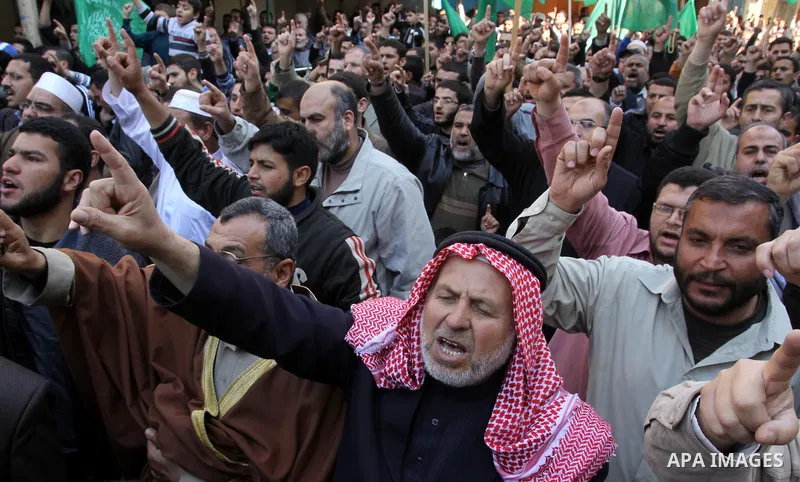 Palestinians take part in a rally calling on Egyptian authorities to supply the Gaza Strip with fuel and electricity in Gaza City March 23, 2012. Israel allowed nine fuel tankers to cross into the Gaza Strip on Friday to...