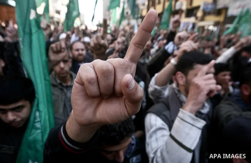 Palestinians take part in a rally calling on Egyptian authorities to supply the Gaza Strip with fuel and electricity in Gaza City March 23, 2012. Israel allowed nine fuel tankers to cross into the Gaza Strip on Friday to...