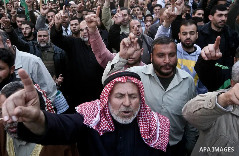 Palestinians take part in a rally calling on Egyptian authorities to supply the Gaza Strip with fuel and electricity in Gaza City March 23, 2012. Israel allowed nine fuel tankers to cross into the Gaza Strip on Friday to...
