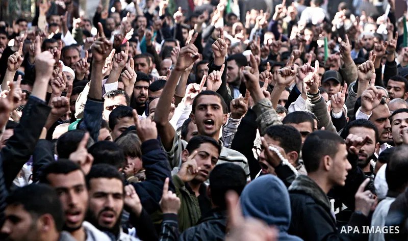 Palestinians take part in a rally calling on Egyptian authorities to supply the Gaza Strip with fuel and electricity in Gaza City March 23, 2012. Israel allowed nine fuel tankers to cross into the Gaza Strip on Friday to...
