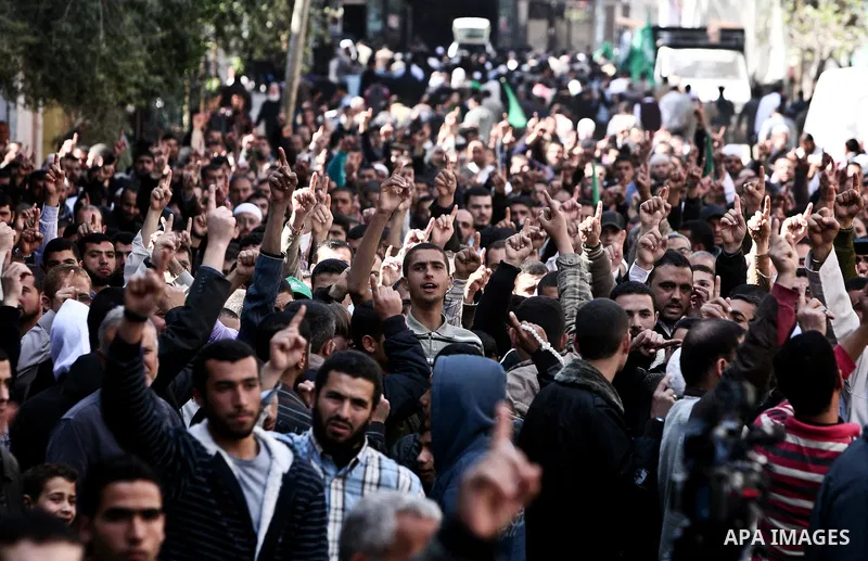Palestinians take part in a rally calling on Egyptian authorities to supply the Gaza Strip with fuel and electricity in Gaza City March 23, 2012. Israel allowed nine fuel tankers to cross into the Gaza Strip on Friday to...