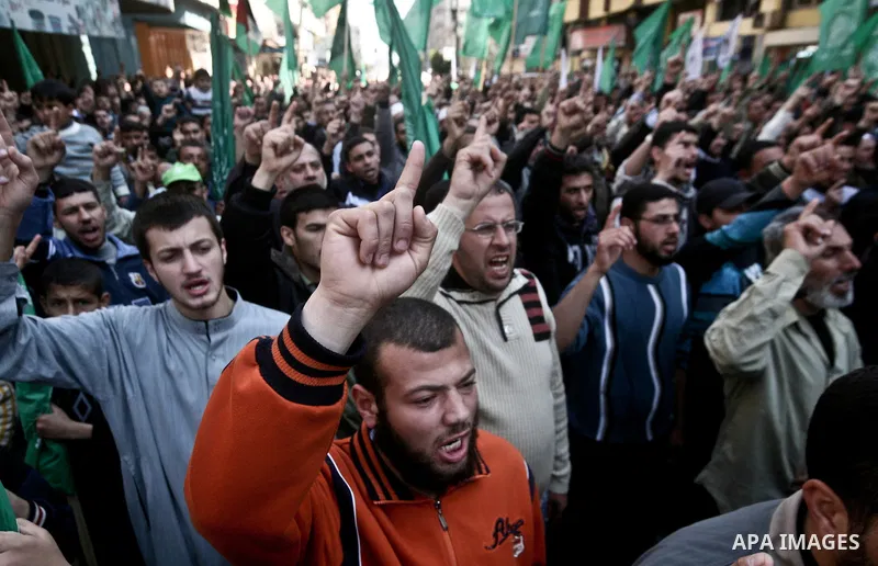 Palestinians take part in a rally calling on Egyptian authorities to supply the Gaza Strip with fuel and electricity in Gaza City March 23, 2012. Israel allowed nine fuel tankers to cross into the Gaza Strip on Friday to...