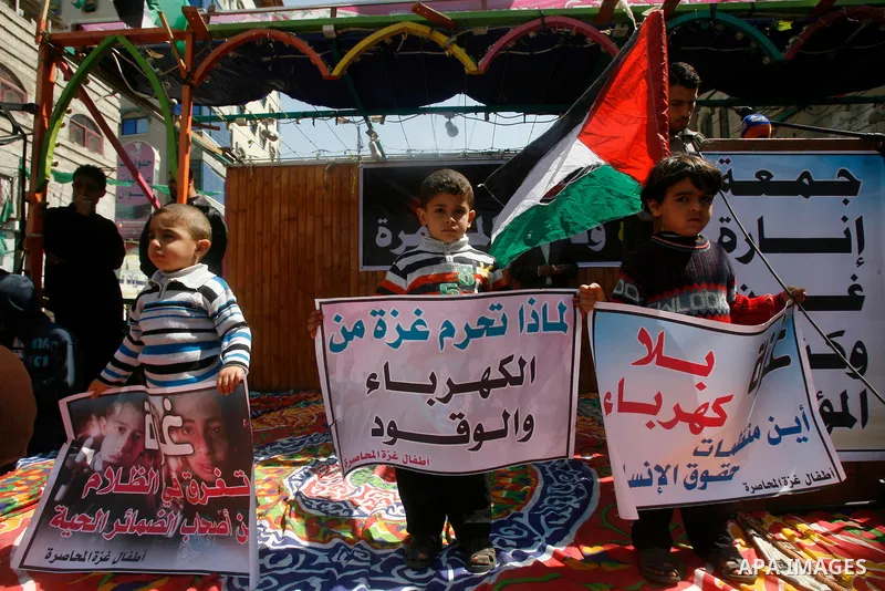 Palestinians take part in a rally calling on Egyptian authorities to supply the Gaza Strip with fuel and electricity in Rafah on the southern Gaza Strip March 23, 2012. Israel allowed nine fuel tankers to cross into the...