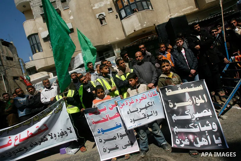 Palestinians take part in a rally calling on Egyptian authorities to supply the Gaza Strip with fuel and electricity in Rafah on the southern Gaza Strip March 23, 2012. Israel allowed nine fuel tankers to cross into the...