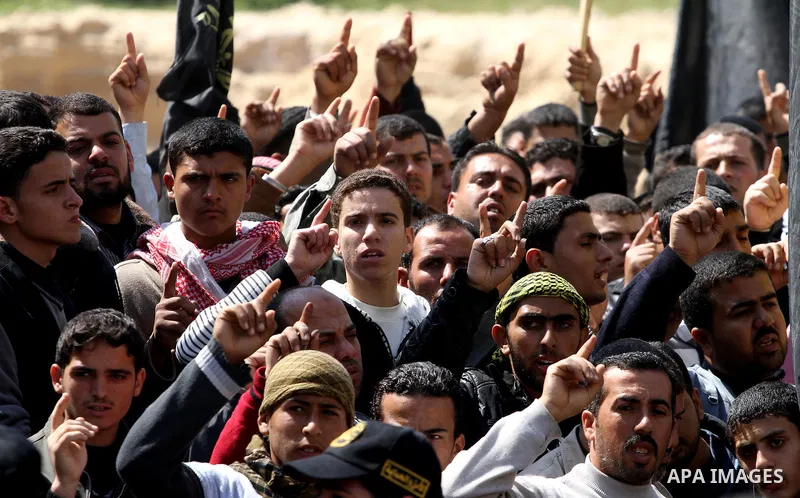 Palestinian Islamic Jihad supporters take part in a rally in support of Hana Shalabi and calling for the release of Palestinian prisoners held in Israeli jails, in Gaza City March 23, 2012. The deteriorating health of Sh...