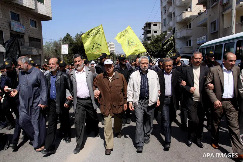 Palestinian Islamic Jihad supporters take part in a rally in support of Hana Shalabi and calling for the release of Palestinian prisoners held in Israeli jails, in Gaza City March 23, 2012. The deteriorating health of Sh...