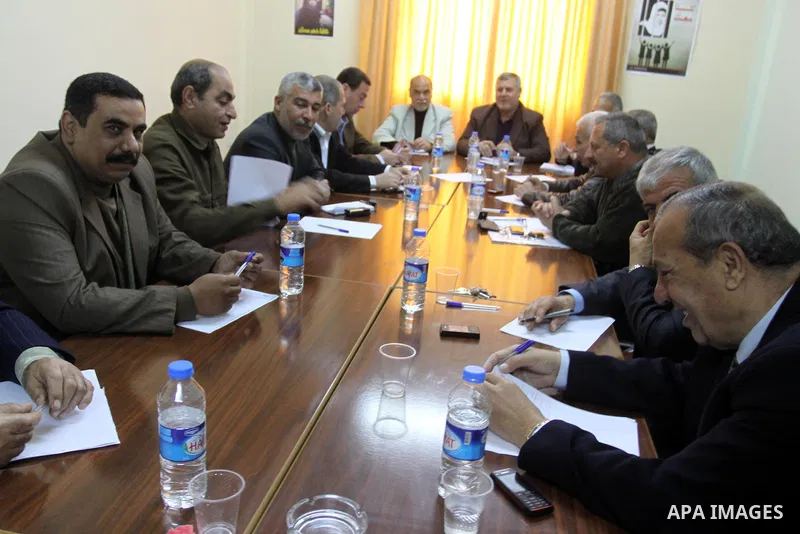 Palestinian factions leaders attend a meeting to discuss power crisis in Gaza city on March 25,2012. Photo by Mohammed Asad