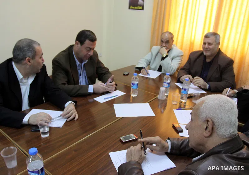 Palestinian factions leaders attend a meeting to discuss power crisis in Gaza city on March 25,2012. Photo by Mohammed Asad