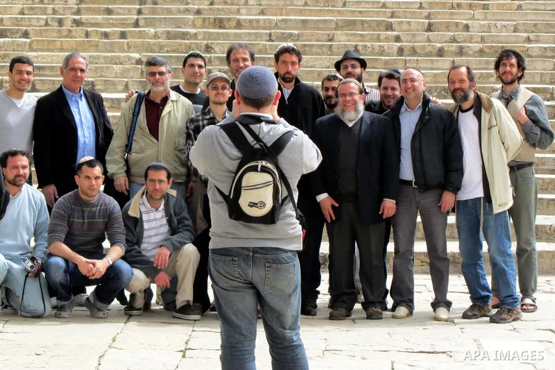 Jewish settler look to the dome of the rock at Al-Aqsa mosque in the old city of Jerusalem on March. 25, 2012. Photo by Mahfouz Abu Turk