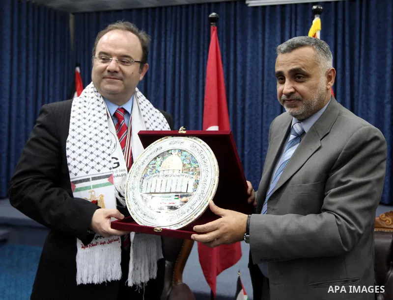 Palestinian Foreign Affairs Minister in Gaza Strip, Mohammed Awad receives President of the Teka Institution in Gaza City on Mar. 27,2012. Photo by Ahmed Shaat