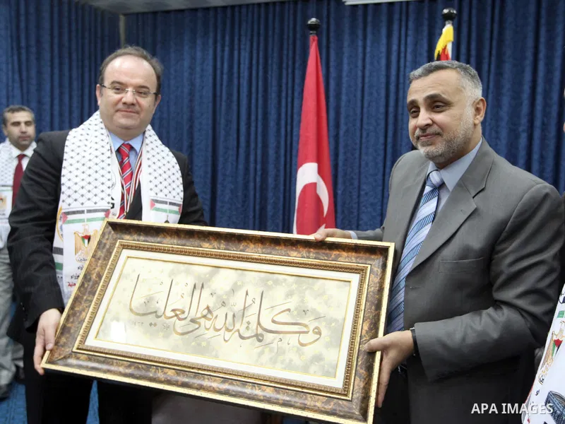 Palestinian Foreign Affairs Minister in Gaza Strip, Mohammed Awad receives President of the Teka Institution in Gaza City on Mar. 27,2012. Photo by Ahmed Shaat