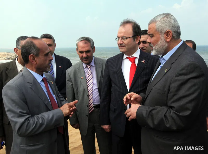 Palestinian Prime Minister in Gaza Strip, Ismail Haniyeh, receives Turkish delegation from "Teka" Foundation in Gaza City on Mar. 28,2012. Photo by Ahmed Shaat