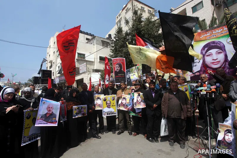 Palestinians take part in a rally in Gaza City, calling for the release of Palestinian prisoners from Israeli jails March 28, 2012. Photo by Ashraf Amra