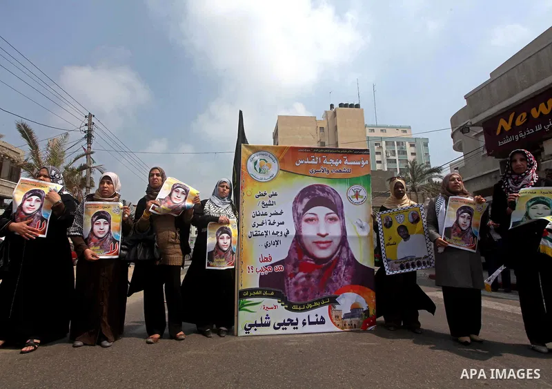 Palestinians take part in a rally in Gaza City, calling for the release of Palestinian prisoners from Israeli jails March 28, 2012. Photo by Ashraf Amra
