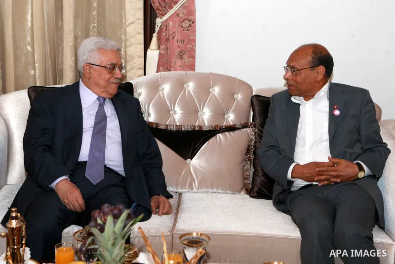 Palestinian President, Mahmoud Abbas (Abu Mazen), meets with Tunisian President Moncef Marzouki, in the Iraqi capital Baghdad, on Mar. 28, 2012. Photo by Thaer Ganaim