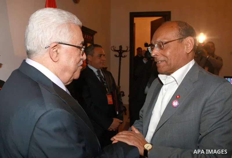 Palestinian President, Mahmoud Abbas (Abu Mazen), meets with Tunisian President Moncef Marzouki, in the Iraqi capital Baghdad, on Mar. 28, 2012. Photo by Thaer Ganaim