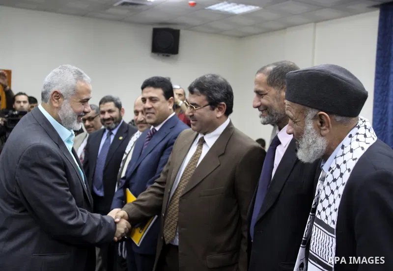 Palestinian Prime Minister in Gaza Strip, Ismail Haniyeh, receives members of Egyptian parliamentary delegation in Gaza City, on March 29, 2012. The delegation is on a solidarity visit with the Palestinian people to the...