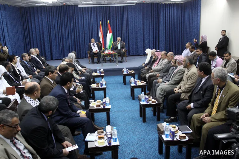 Palestinian Prime Minister in Gaza Strip, Ismail Haniyeh, receives members of Egyptian parliamentary delegation in Gaza City, on March 29, 2012. The delegation is on a solidarity visit with the Palestinian people to the...