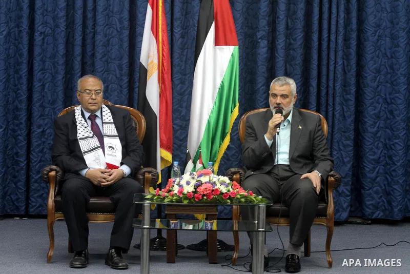 Palestinian Prime Minister in Gaza Strip, Ismail Haniyeh, receives members of Egyptian parliamentary delegation in Gaza City, on March 29, 2012. The delegation is on a solidarity visit with the Palestinian people to the...