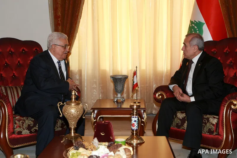 Palestinian President Mahmoud Abbas meets with Lebanese President Michel Suleiman in Baghdad, Iraq, Thursday, March, 29, 2012. The annual Arab summit meeting opened in the Iraqi capital Baghdad on Thursday with only 10 o...