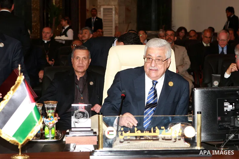 Palestinian President Mahmoud Abbas attends the Arab League summit in Baghdad, Iraq, Thursday, March, 29, 2012. The annual Arab summit meeting opened in the Iraqi capital Baghdad on Thursday with only 10 of the leaders o...