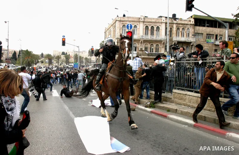 Israeli police officers on horseback scuffle with Palestinians during clashes on Land Day after Friday prayers outside Damascus Gate in Jerusalem's Old City March 30, 2012. Israeli security forces fired rubber bullets, t...