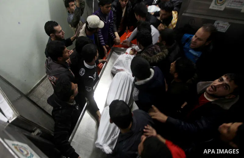 Palestinians mourner for Mahmud Zakut during his funeral in Beit Lahia, north of the Gaza strip, on March 30, 2012. Israeli troops shot dead 20-year-old Zakut in Beit Hanun near the border fence with Israel, north of Gaz...