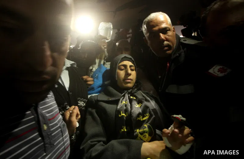 Hana Shalabi arrives to al-Shifa hospital in Gaza City, Sunday, April 1, 2012. Israel has released Shalabi, a 30-year-old Islamic Jihad supporter from the West Bank, and sent her to the Gaza Strip as part of a compromise...