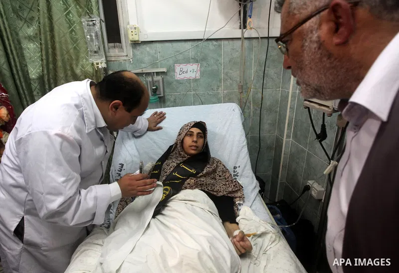 Hana Shalabi arrives to al-Shifa hospital in Gaza City, Sunday, April 1, 2012. Israel has released Shalabi, a 30-year-old Islamic Jihad supporter from the West Bank, and sent her to the Gaza Strip as part of a compromise...