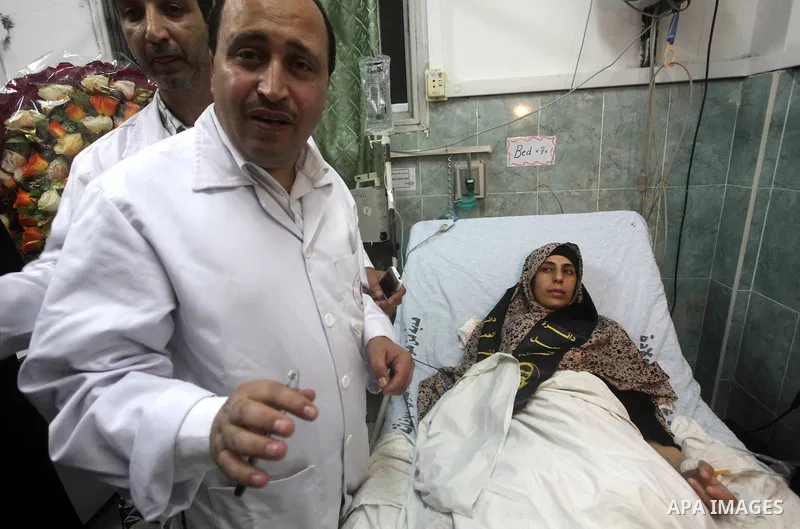 Hana Shalabi arrives to al-Shifa hospital in Gaza City, Sunday, April 1, 2012. Israel has released Shalabi, a 30-year-old Islamic Jihad supporter from the West Bank, and sent her to the Gaza Strip as part of a compromise...
