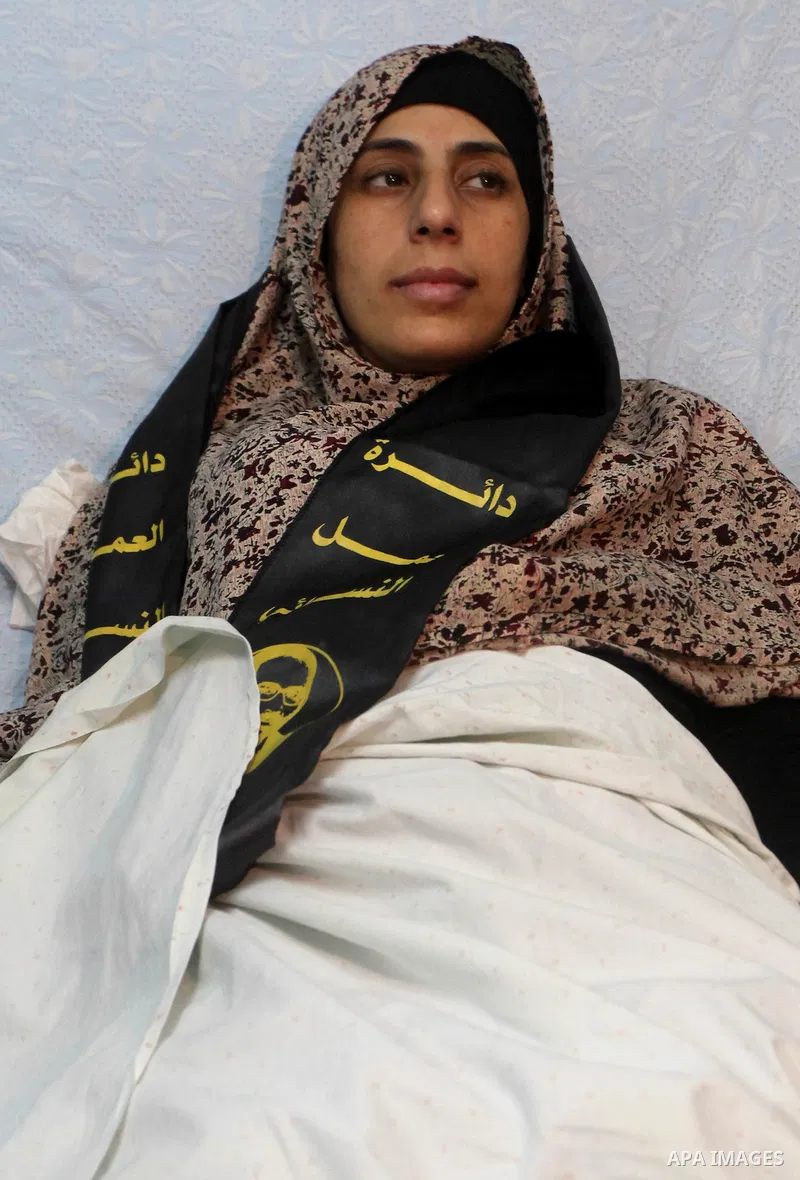 Hana Shalabi arrives to al-Shifa hospital in Gaza City, Sunday, April 1, 2012. Israel has released Shalabi, a 30-year-old Islamic Jihad supporter from the West Bank, and sent her to the Gaza Strip as part of a compromise...