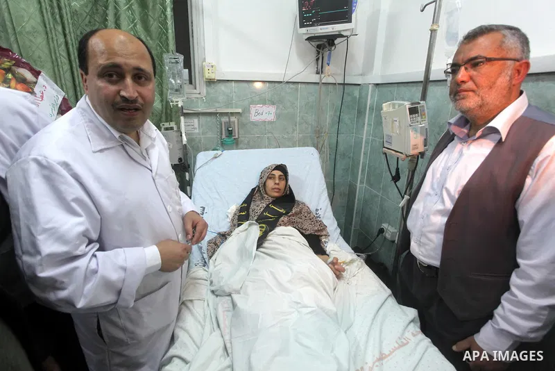 Hana Shalabi arrives to al-Shifa hospital in Gaza City, Sunday, April 1, 2012. Israel has released Shalabi, a 30-year-old Islamic Jihad supporter from the West Bank, and sent her to the Gaza Strip as part of a compromise...