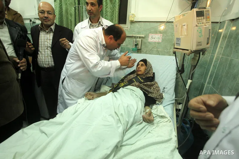Hana Shalabi arrives to al-Shifa hospital in Gaza City, Sunday, April 1, 2012. Israel has released Shalabi, a 30-year-old Islamic Jihad supporter from the West Bank, and sent her to the Gaza Strip as part of a compromise...