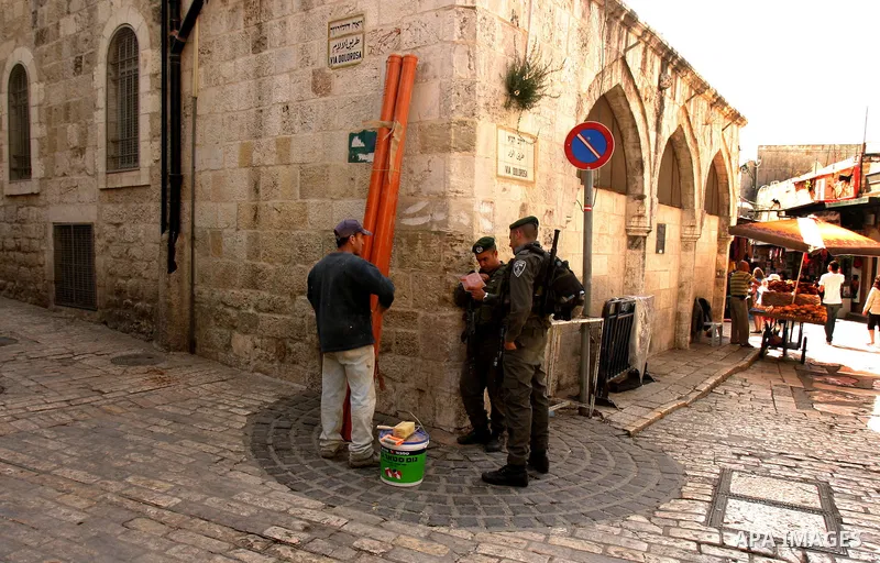 Israeli border policemen stand guard at an Old City gate in Jerusalem on Apr. 02, 2012. Photo by Mahfouz Abu Turk