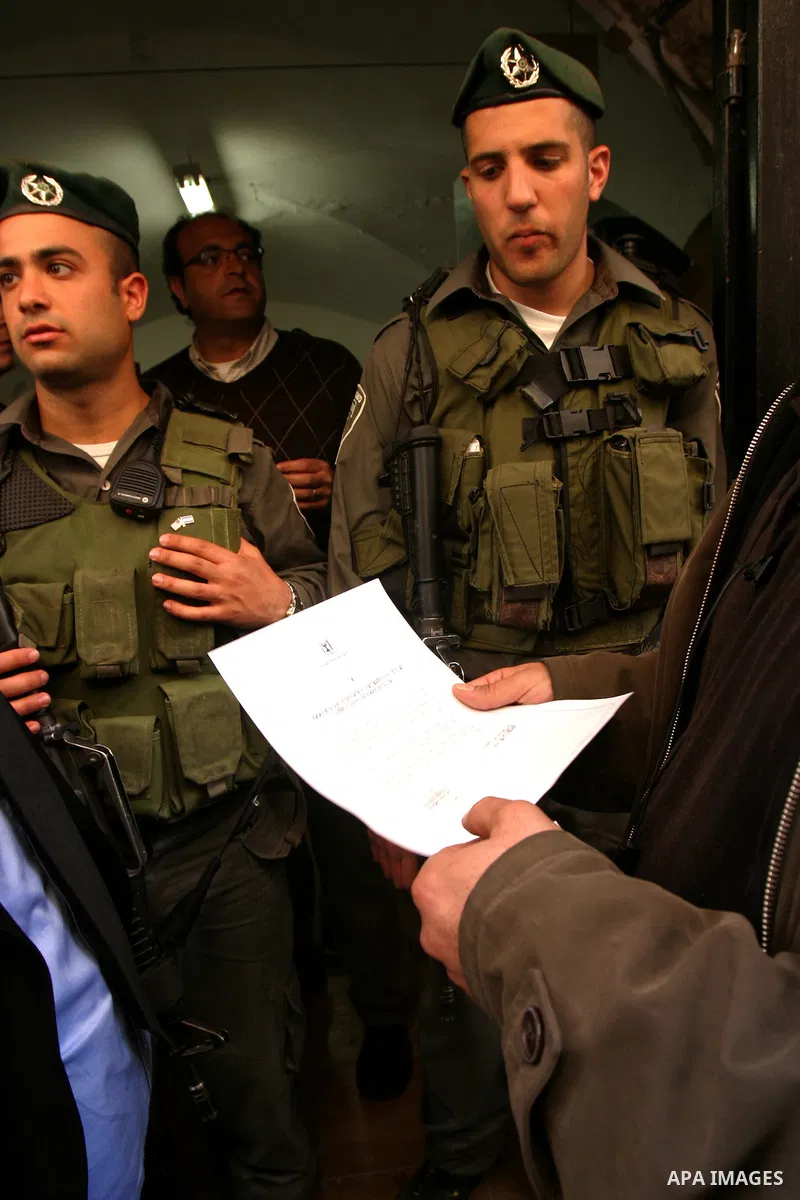 Israelis police stand guard in front of network "Hona Al Quds" in Jerusalem's Old City on Apr. 02, 2012 . Photo by Mahfouz Abu Turk