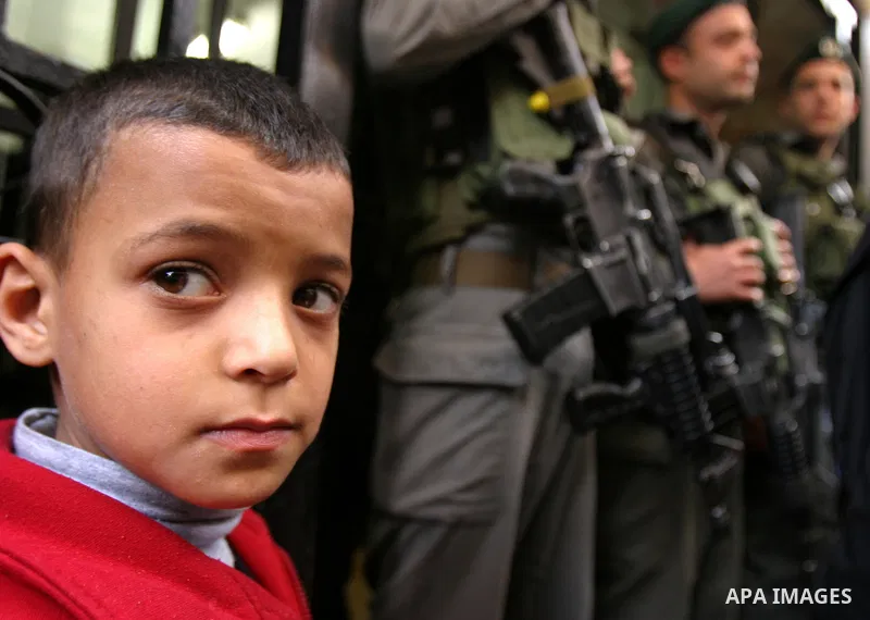 Israelis police stand guard in front of network "Hona Al Quds" in Jerusalem's Old City on Apr. 02, 2012 . Photo by Mahfouz Abu Turk